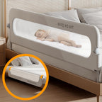 Baranda plegable de malla gris instalada junto a una cama
